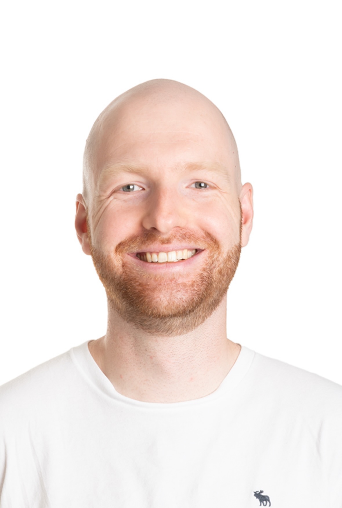 Studio headshot of Simon Dhaenens, smiling.